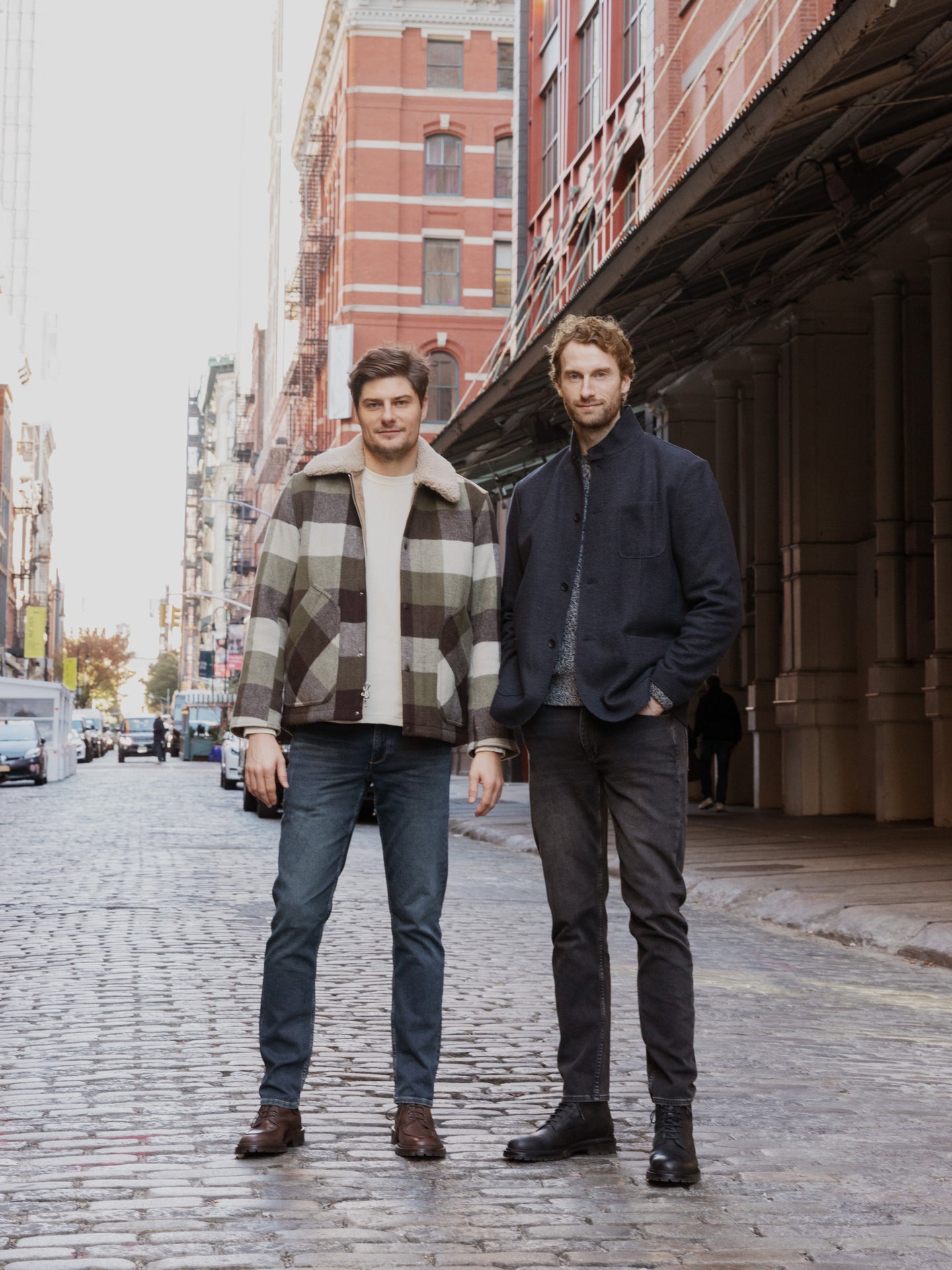 Johannes and Chris pose in SoHo wearing rag & bone jackets, jeans, and boots