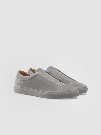 Men's grey Italian leather suede slip on dress sneaker with tonal rubber sole.