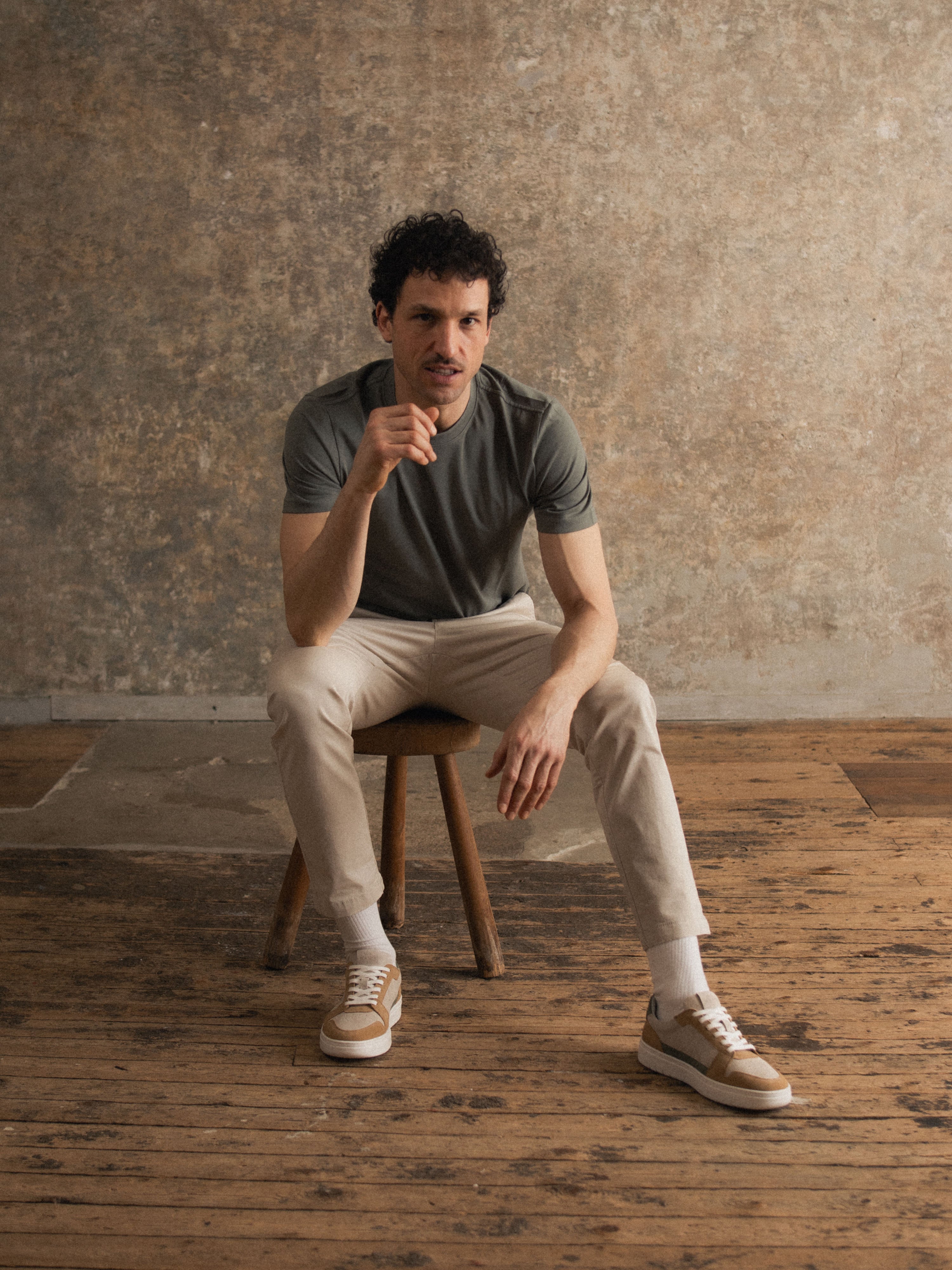 Man sitting wearing Men