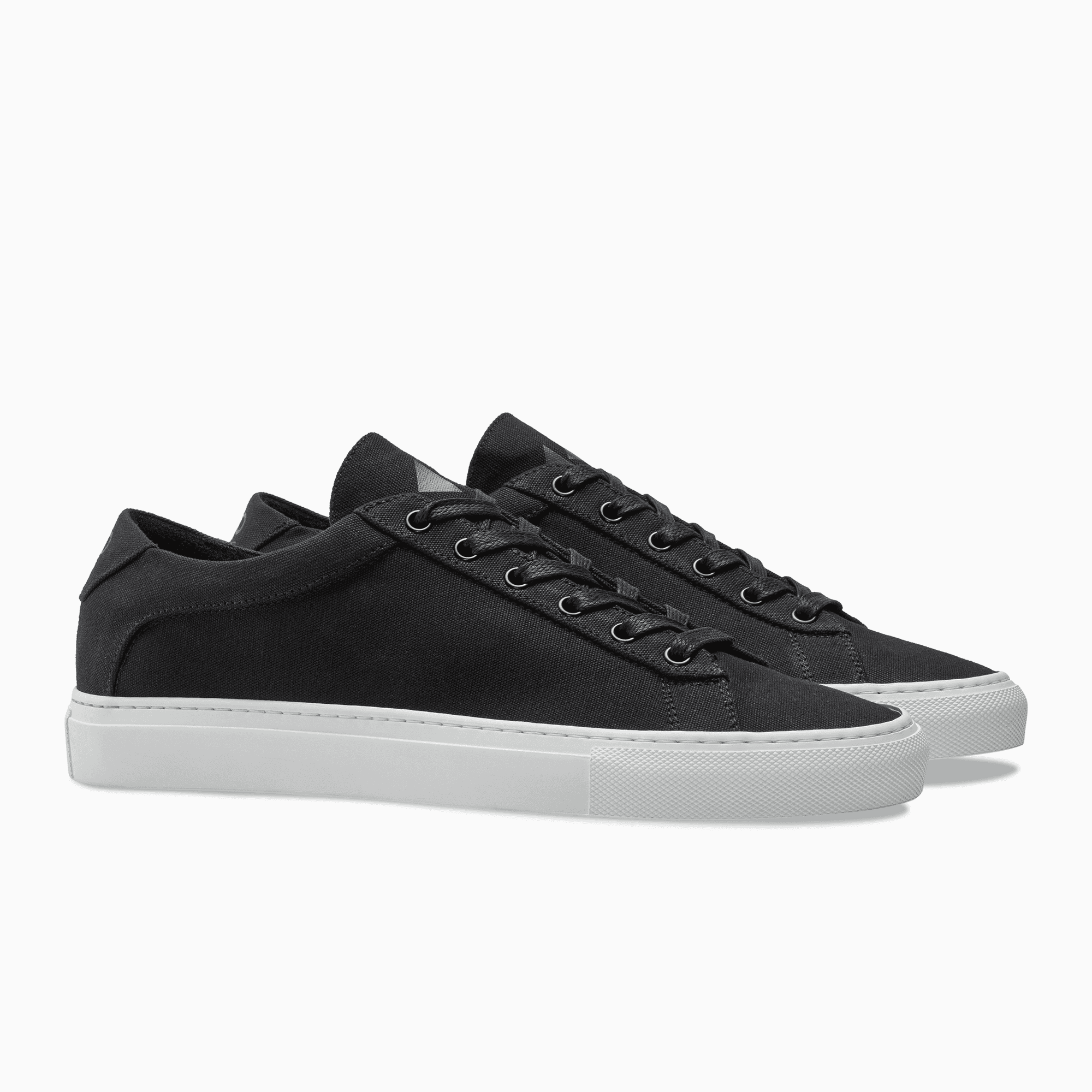 Black Canvas Low Top Sneaker white sole  Mens Koio